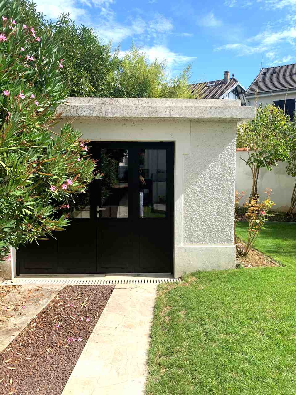 Porte de garage installée par PROXIRÉNOV
